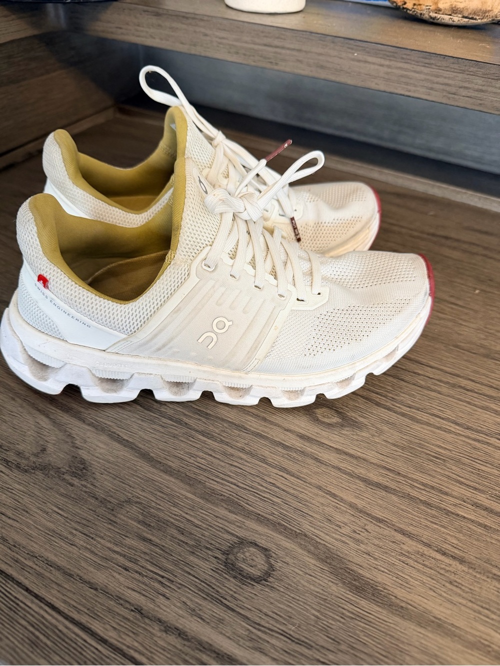 On Running White Athletic Sneakers with Olive Lining and Pink Toe Accents
